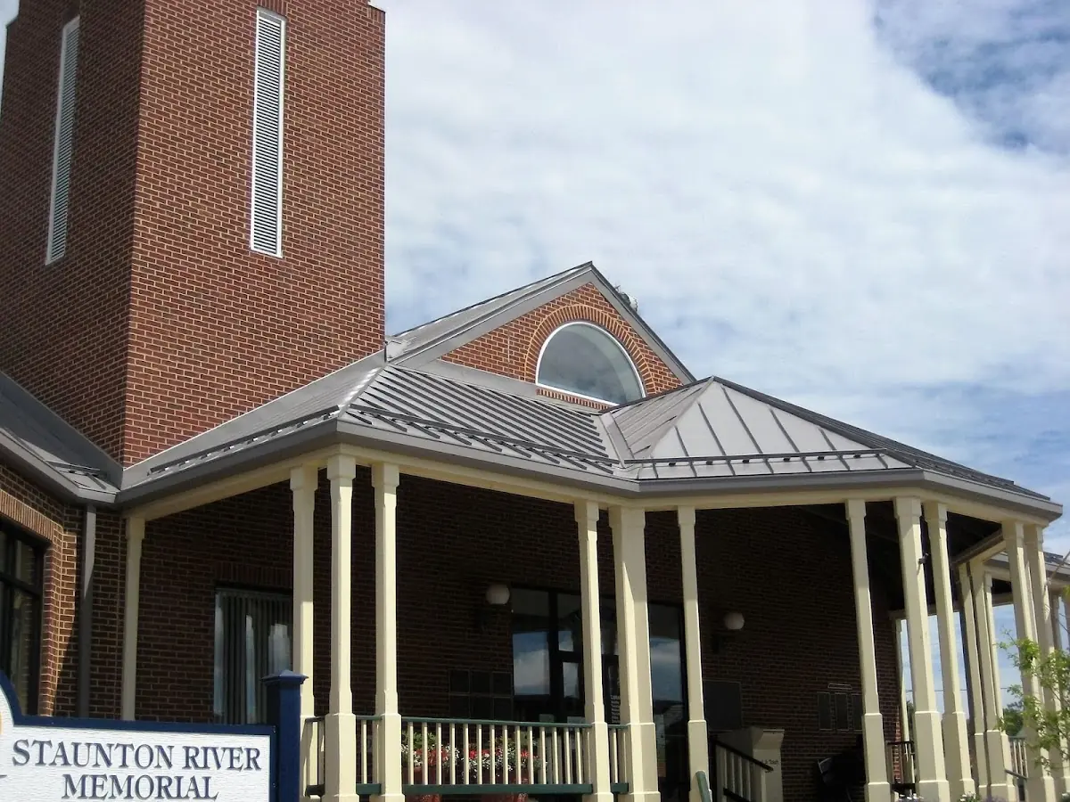 Skilled roofing craftsmen working on a residential roof in Milwaukee